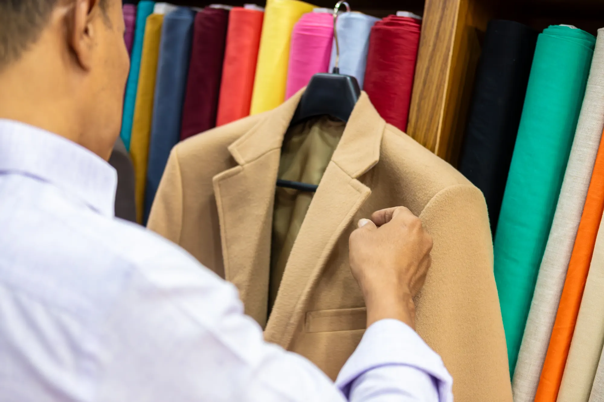 Premium fabric selection and color choices at New David Jone Fashion - custom suit materials in Phuket Thailand