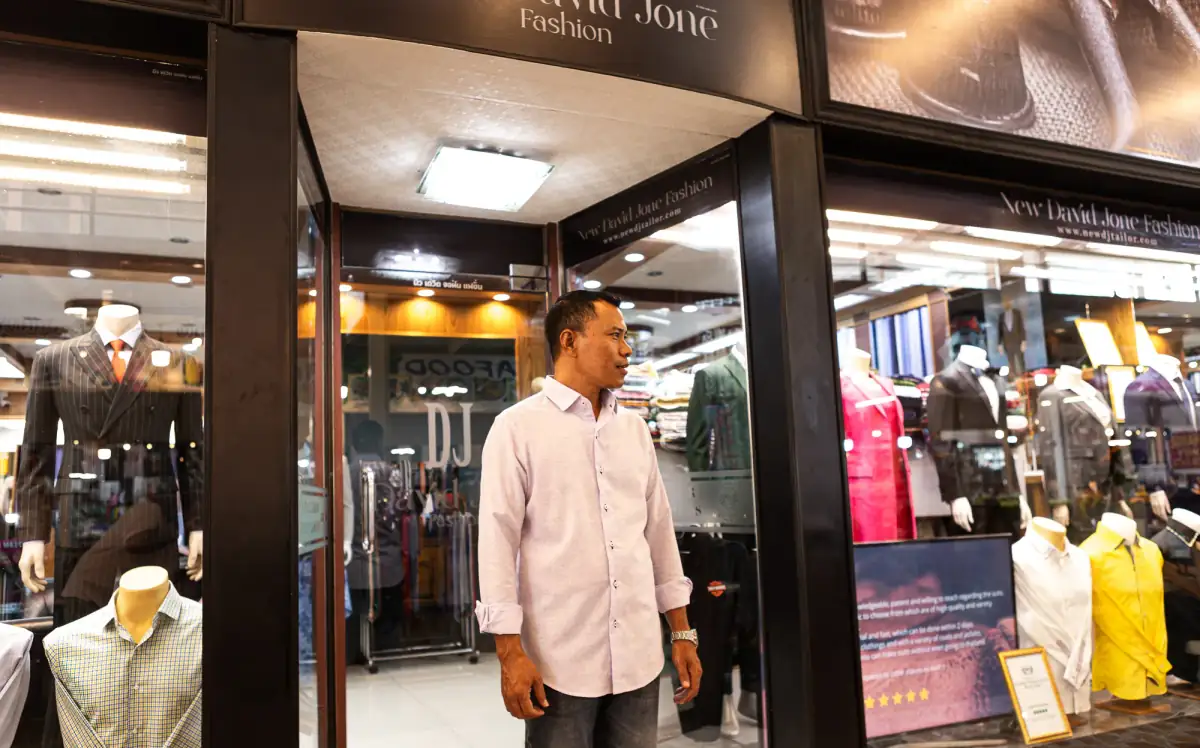 Johnny standing at the New David Jone Fashion shopfront inside OTOP Shopping Paradise, Patong
