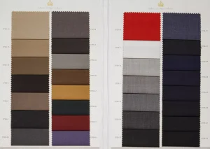 Open Collins and Co Hugo Collection 3799 swatch book with camel, brown, green, red, grey and navy cloth