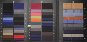 Open Enrico Zenoni Revolution Vol. 1 swatch book with wool in navy, grey, pink, lime, blue and orange