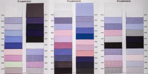 Open Fabrizio Red Book with white, lilac, blue, pink, purple and black shirt cottons