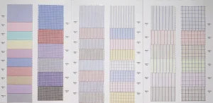 Open Oxford Pinpoint swatch book with pastel shirt cottons in blue, pink, green, lilac and lemon