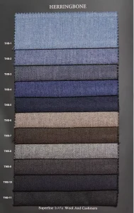 Herringbone swatch page with blue, grey and brown herringbone wool